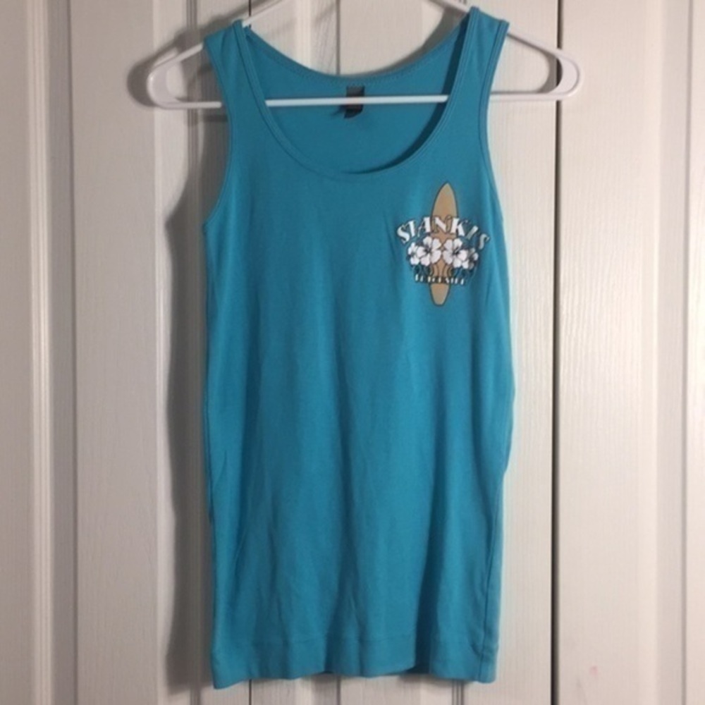 District Spanky’s teal tank top featuring …